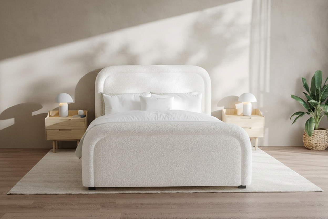 Aria Boucle Bed - front-facing view with white linen bedding