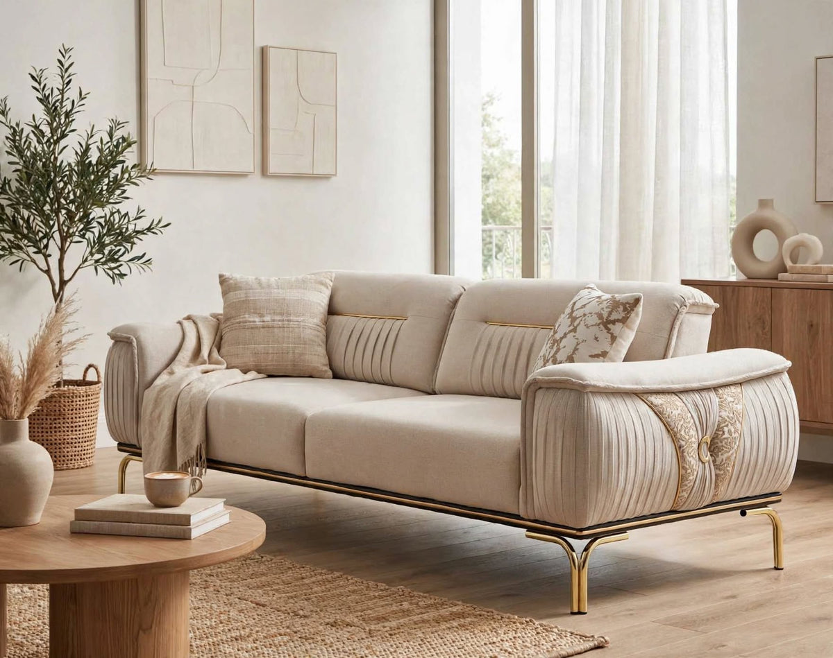 Versace-Style Pleated Sofa in Beige Sand Fabric with gold legs - lifestyle view